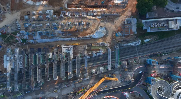 Overhead view of the RTS Link depot and track works, with cranes and stabling roads laid out below