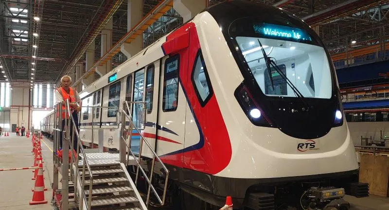 The RTS Link train in its red, blue and white livery, unveiled at Singapore's Tuas rail test centre